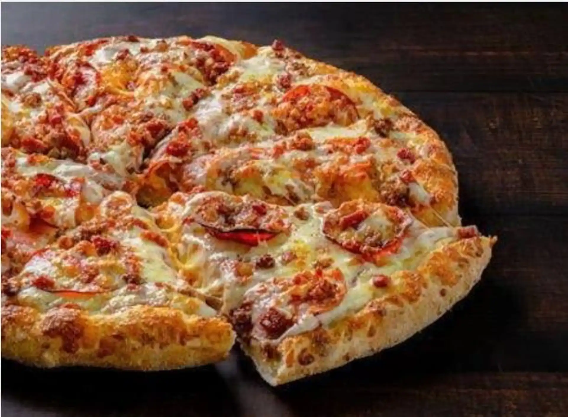 Meat Lovers Deep Dish Pizza at Chicago Deep Dish Pizza Calgary - Authentic Chicago-style Deep Dish Pizza