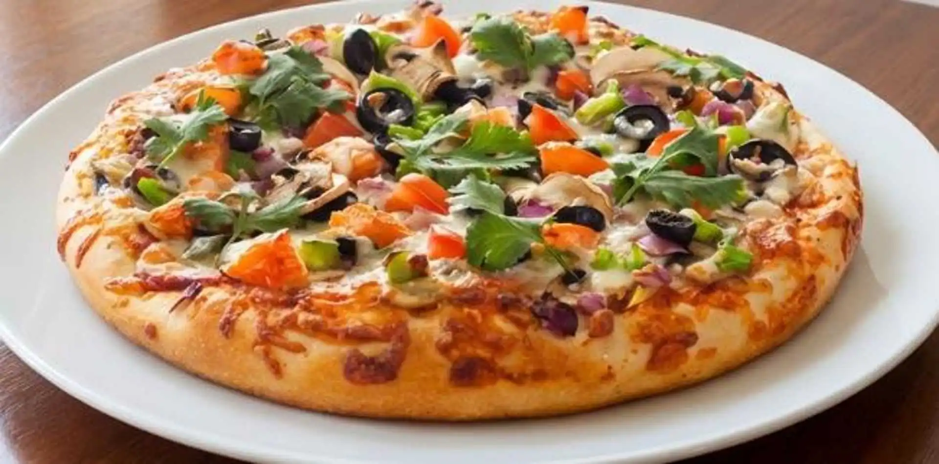 The Desi Pizza - Signature deep dish at Chicago Deep Dish Pizza Calgary